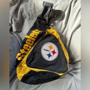 Gently used Steelers one shoulder backpack or sling bag